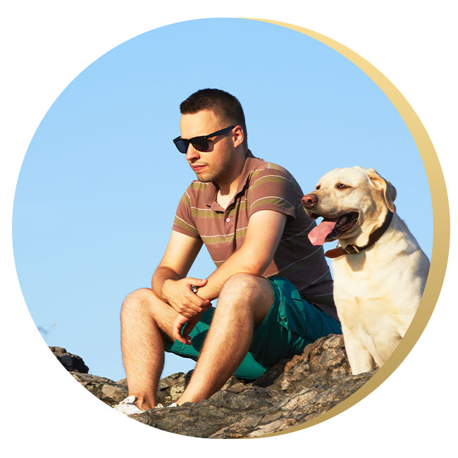 truama-testimonial man sitting with dog