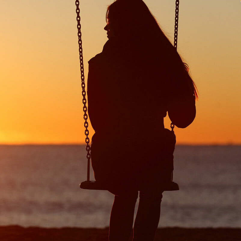 teen on swing with adolescent anxiety considers therapy in florida